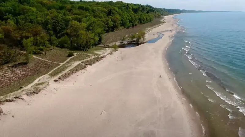 Aerial view of a Lake Michigan and its sandy beach