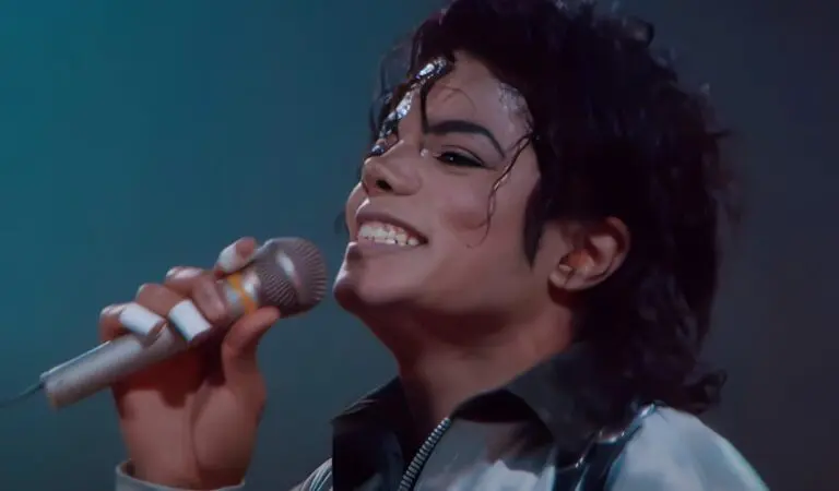 Michael Jackson sings in the microphone